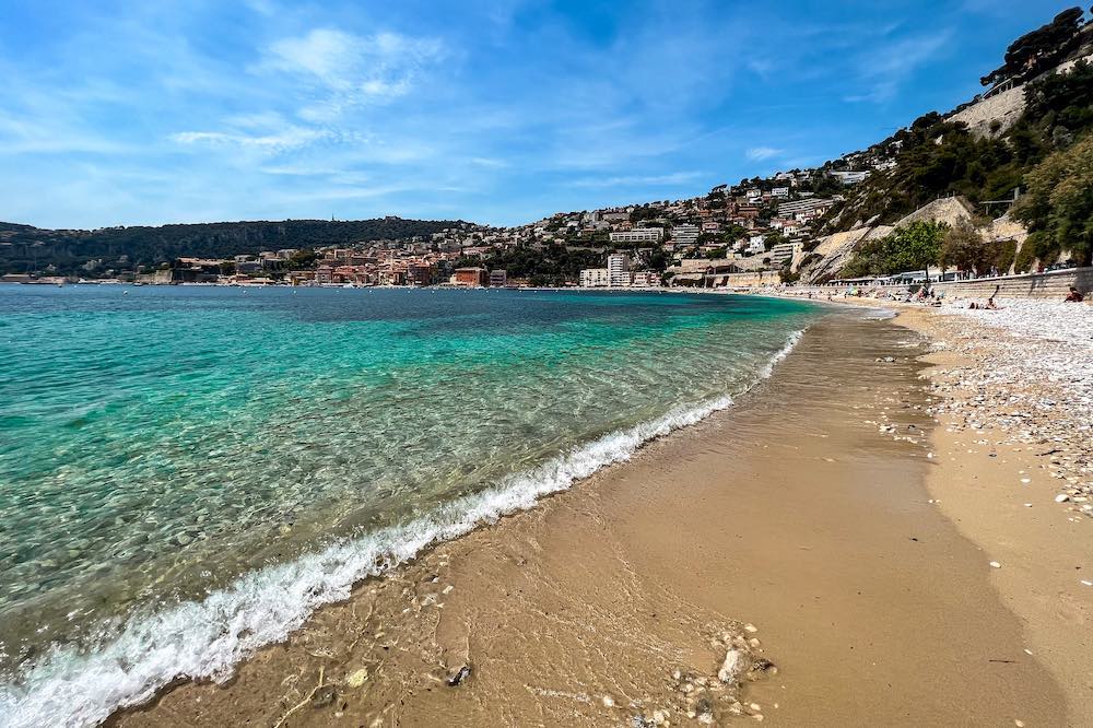 Plage des Marinières in Villefranche-sur-Mer with calm turquoise water