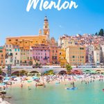 Sunbathers on a Menton beach with Old Town behind