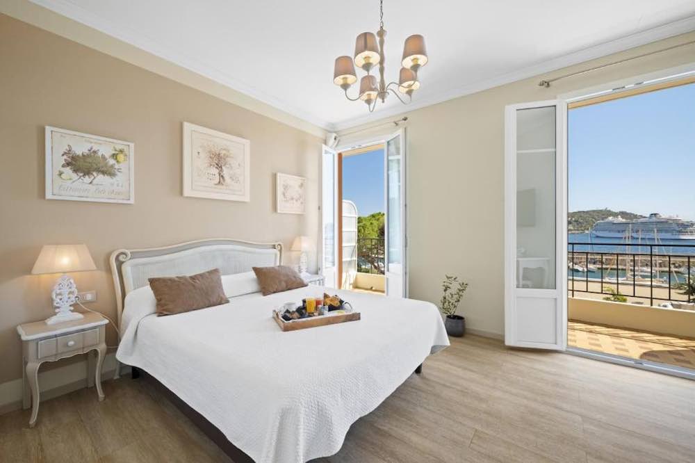 Classically styled bedroom overlooking the bay