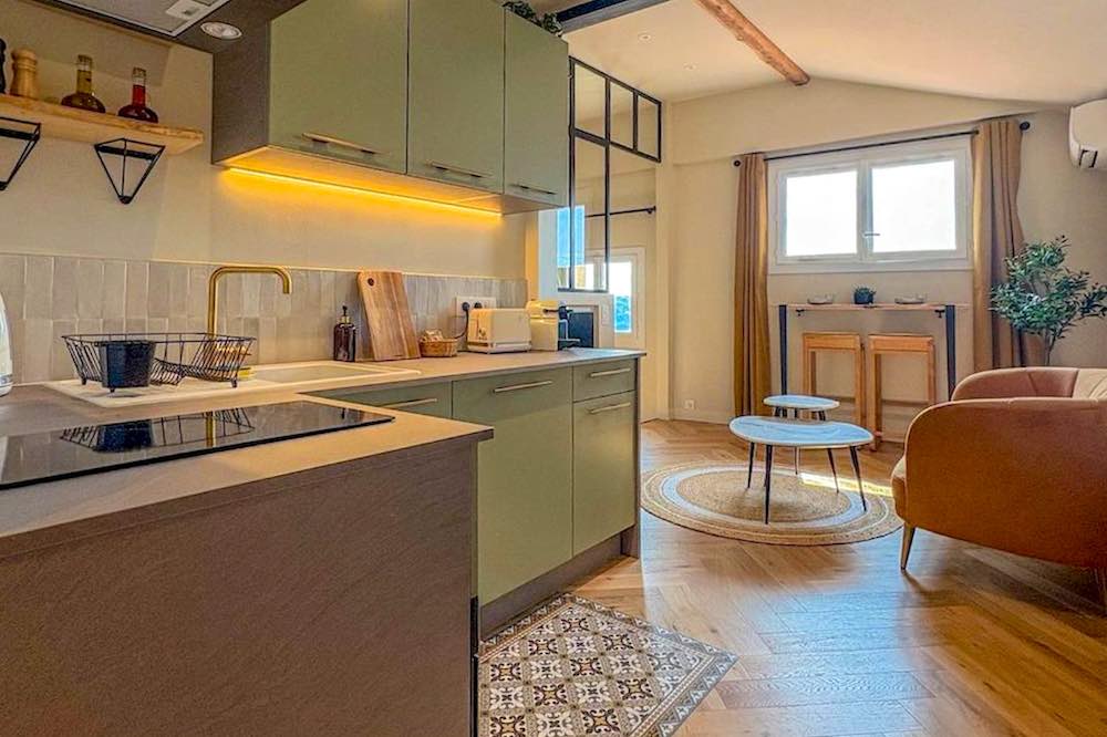 Vintage-style kitchen and seating area in a small condo