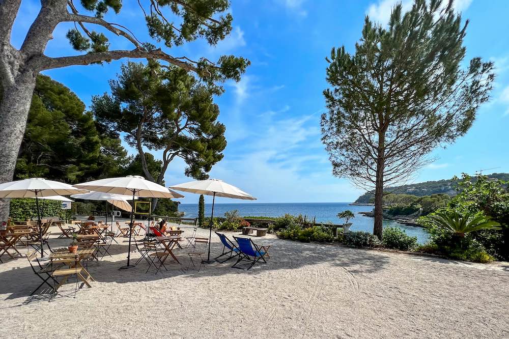 The cafe terrace at Jardin de la Paix overlooking Plage des Fossettes is a great place to end the Pointe Saint-Hospice coastal walk in Cap Ferrat