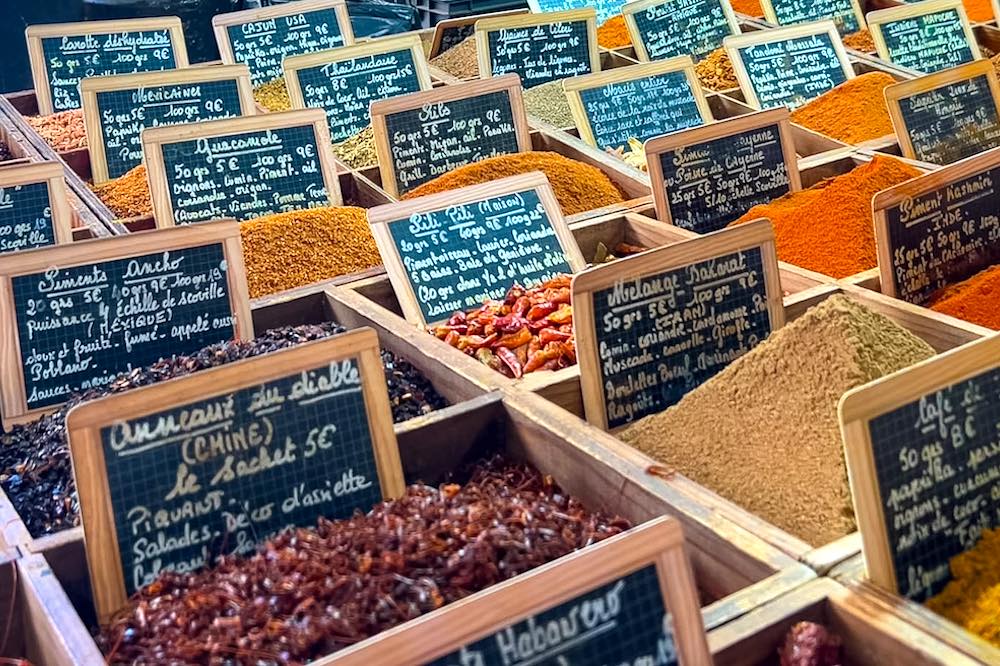 Colorful spices and herbs at Marché Provençal in Antibes
