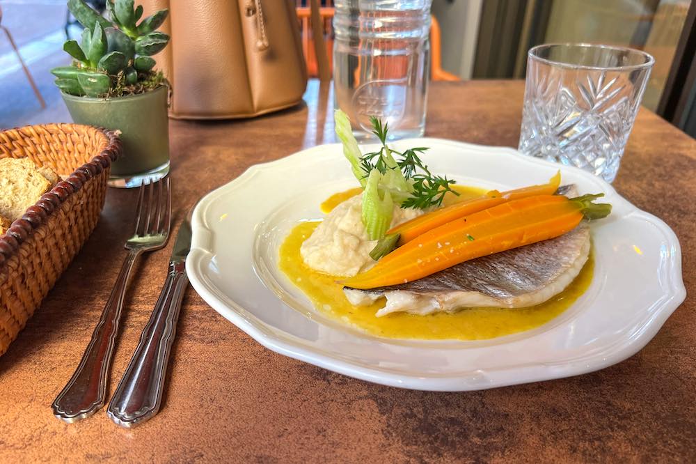 Sea bream fillet with baby carrots, celery root purée, and an orange and turmeric at La Table d'Hotes Cannes