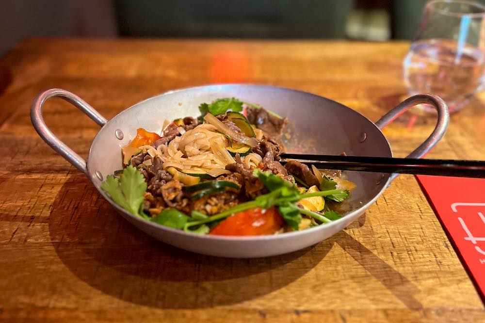 Stir-fried rice noodles with beef at Madame Hien's Vietnamese restaurant in Cannes